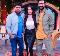 Vicky Kaushal, Kapil Sharma, and Nora Fatehi in The Kapil Sharma Show: Nora Fatehi & Vicky Kaushal (2019)