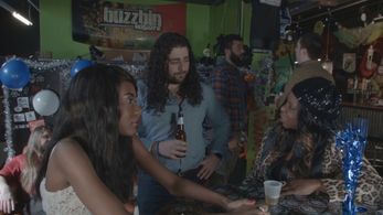 Still from “Science Boys High School Reunion” Featuring Sharon and Scott Thresher