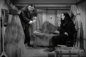 John Astin, Carolyn Jones, and Felix Silla in The Addams Family (1964)