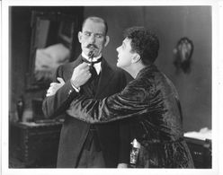 Lon Chaney and Raymond McKee in A Blind Bargain (1922)