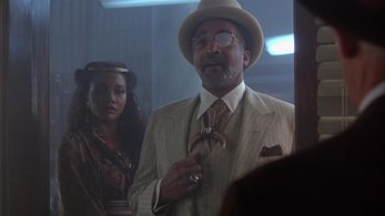 David Downing and Arnetia Walker in Cast a Deadly Spell (1991)