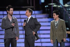Ryan Seacrest, David Cook, and David Archuleta in American Idol (2002)