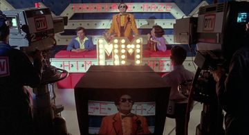 Barry Humphries, Manning Redwood, and Darlene Johnson in Shock Treatment (1981)