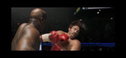 Beard getting tested by Khris Davis. Big George Foreman 2023 Sony Pictures.