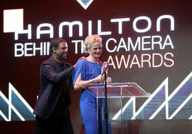 Denzel Washington presenting The Hamilton Behind The Camera Award for Best Cinematography to Charlotte Bruus Christensen