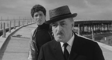 Ninetto Davoli and Totò in The Hawks and the Sparrows (1966)