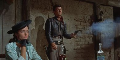 Donna Reed and William Campbell in Backlash (1956)