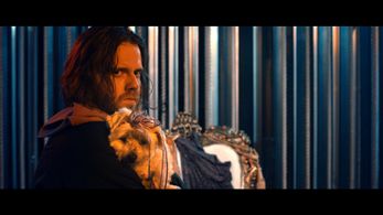 Kent watches Brady leave to make his entrance on stage