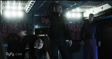 Aaron Ashmore, Stephanie Leonidas, and Thom Allison in Killjoys (2015)