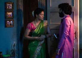 Saiyami Kher and Roshan Mathew in Choked (2020)