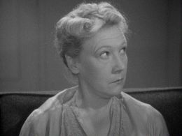 Claire Whitney in When Strangers Marry (1944)
