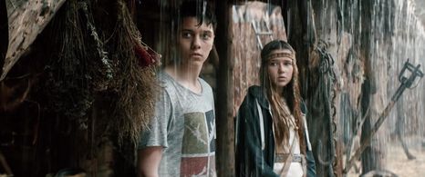 Danylo Kamenskyi and Eva Koshova in The Stronghold (2017)