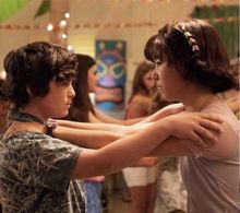 Maya Erskine and Taj Cross in PEN15 (2019)