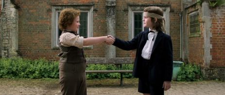 Hector Bateman-Harden and Codie-Lei Eastick in Holmes & Watson (2018)