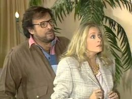 Kostas Karras and Nora Valsami in O hiros, i hira kai ta heirotera (1993)