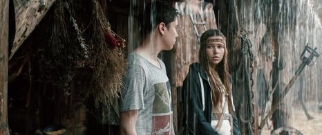 Danylo Kamenskyi and Eva Koshova in The Stronghold (2017)