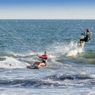 Kitesurfing in the Pacific Ocean: Sexy Kitegirl Kiteboarder Sabrina Parisi rider for Flysurfer Kiteboarding