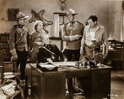 Francis X. Bushman Jr., George Chesebro, Earl Dwire, Robert Walker, Lois Wilde, and Rin Tin Tin Jr. in Caryl of the Moun