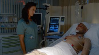 Janet Kidder and Artin John in The X-Files (1993)