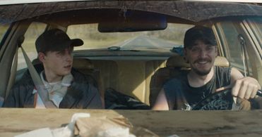 Kyle Gallner and Johnny Berchtold in The Passenger (2023)