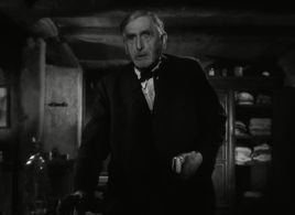 Maurice Schutz in It Happened at the Inn (1943)