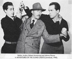 Robert Armstrong, Johnny Downs, and Bobby Jordan in Adventures of the Flying Cadets (1943)