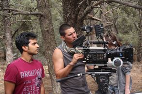 Asif Akbar directing on the set of Frontlines in 2014.