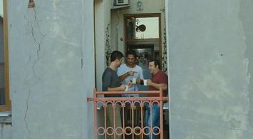 Erdem Akakçe, Özcan Deniz, and Ragip Savas in Ya Sonra (2011)