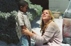 Mary McCormack and Scotty Noyd Jr. in Right at Your Door (2006)