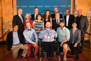 The cast of I Am Potential posing with the real life Hughes family at the premiere along with director and producer Zach