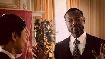 A still frame of Robin F. Baker and Joomin Hwang in A New Age: Clash Of Civilizations directed by Kiyun Sung