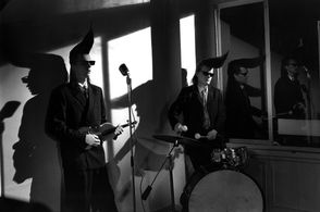 Twist-Twist Erkinharju, Jore Marjaranta, and Leningrad Cowboys in Leningrad Cowboys: Those Were the Days (1992)