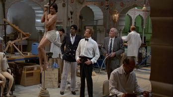 Roger Moore, Desmond Llewelyn, and Vijay Amritraj in Octopussy (1983)