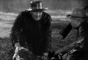 John Larkin and Ernest Torrence in Sporting Blood (1931)