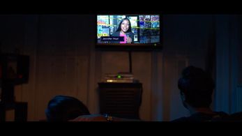 Nicole Aiken as reporter 