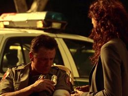 Sofia Milos and John Thaddeus in CSI: Miami (2002)