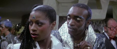 Grace Kennedy, Michael Logan, and Ray Shell in The Apple (1980)