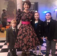 Casey Wilson, Kensington Tallman, Toby Grey and Beau Herlie Cecil on set for Black Monday