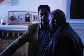 Director Shuaib Mitchell in Consultation with Lawrence-Hilton Jacobs
