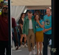 Traci Belushi and Macklemore 