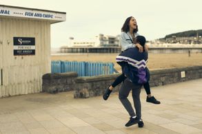 Gamba Cole and Rhianne Barreto in The Outlaws (2021)