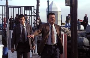 DYLAN WALSH and PAUL RODRIGUEZ in Malpaso Productions' suspense thriller 