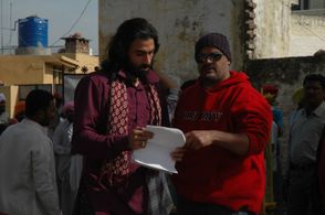 Actor Romeo Sharma rehearsing with director Puneet Sira on the set of Kisaan (2009)