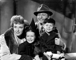 Robert Young, Laraine Day, Margaret O'Brien, and William Severn in Journey for Margaret (1942)