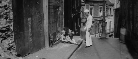 Anouk Aimée, Gérard Delaroche, and Alan Scott in Lola (1961)