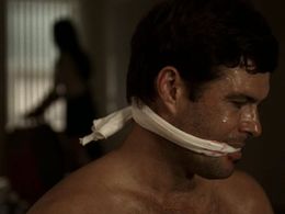 Mia Kirshner and Carlos Bernard in 24 (2001)