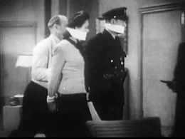 Hal Craig, John Davidson, and Lorna Gray in Captain America (1944)