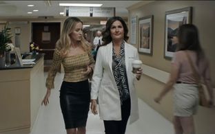 Emily Blunt and A.K. Benninghofen in Pain Hustlers (2023)