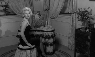 Christine Fabréga and Jacques Léonard in Le Deuxième Souffle (1966)