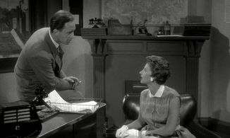 Rona Anderson and Peter Burton in Spin a Dark Web (1956)